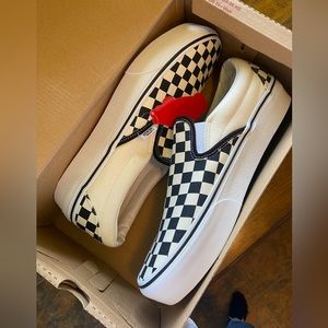 white and black Checkerboard slip on platform vans size 10.5 men’s 12 women’s